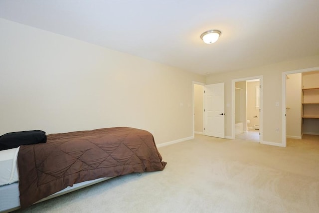 68 Dresser Hill Number 2 Rd, Dudley, MA 01571 - bedroom with light carpet, a spacious closet, and ensuite bathroom