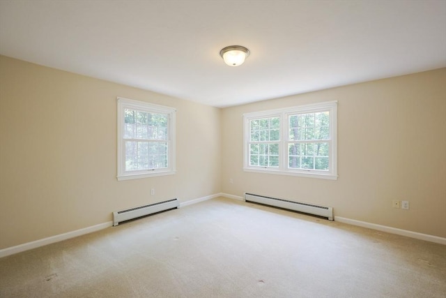 68 Dresser Hill Number 2 Rd, Dudley, MA 01571 - carpeted empty room with baseboard heating and plenty of natural light