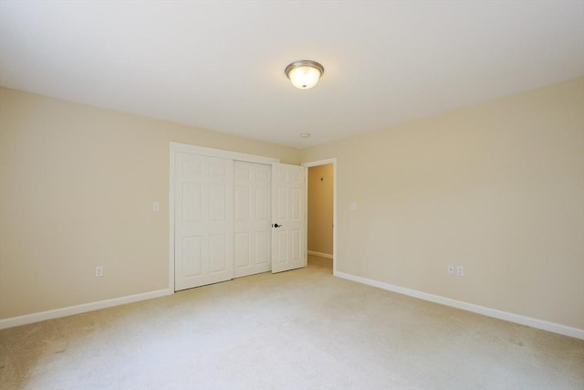 68 Dresser Hill Number 2 Rd, Dudley, MA 01571 - unfurnished bedroom featuring light colored carpet and a closet