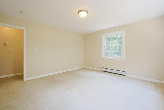 68 Dresser Hill Number 2 Rd, Dudley, MA 01571 - empty room featuring a baseboard heating unit, light colored carpet, and a smoke detector