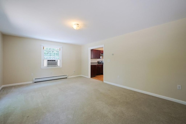 68 Dresser Hill Number 2 Rd, Dudley, MA 01571 - empty room with a baseboard heating unit, cooling unit, and light carpet