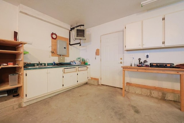 68 Dresser Hill Number 2 Rd, Dudley, MA 01571 - kitchen with unfinished concrete flooring, electric panel, white cabinetry, and open shelves