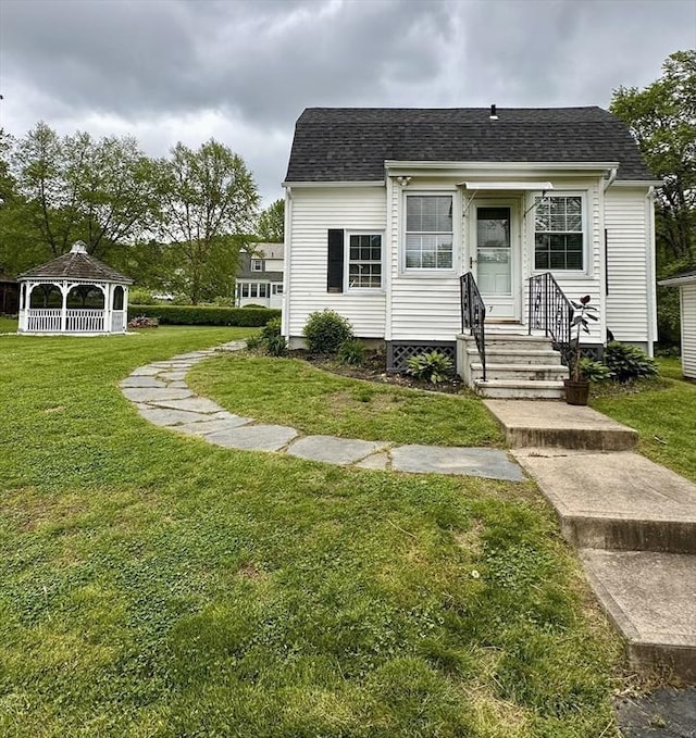 17 Walnut St, Gill, MA 01354 - view of front of home with a gazebo, a front lawn, entry steps, and a shingled roof