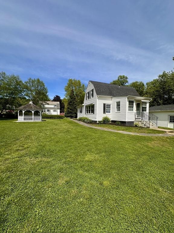 17 Walnut St, Gill, MA 01354 - view of front of house with a gazebo and a front yard
