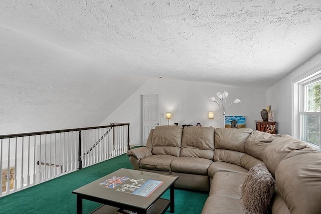 carpeted living area featuring a textured ceiling and lofted ceiling