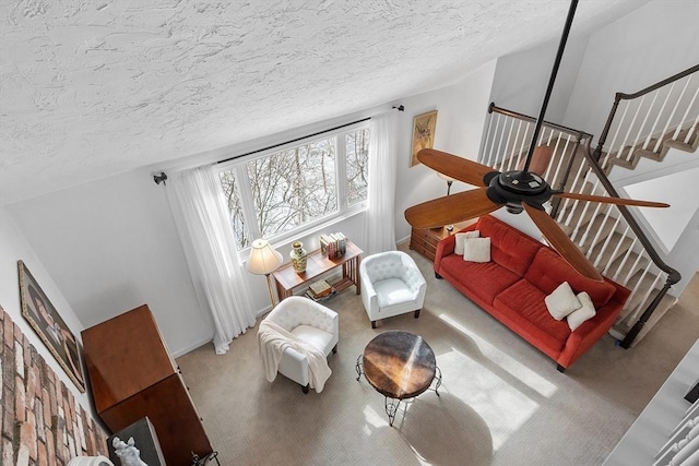 interior space featuring a textured ceiling, stairway, and carpet flooring