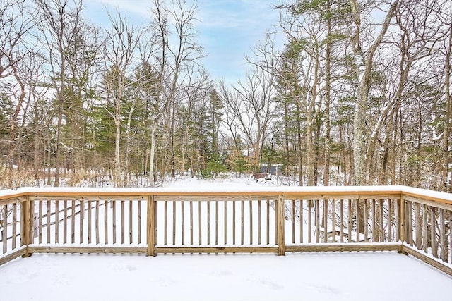 view of snow covered deck