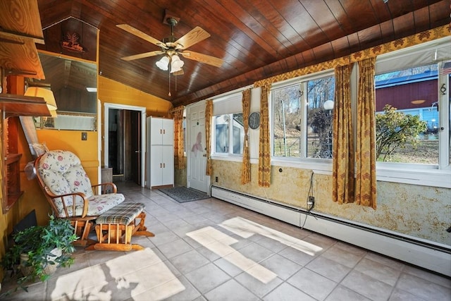 unfurnished sunroom with ceiling fan, wooden ceiling, a baseboard heating unit, and lofted ceiling