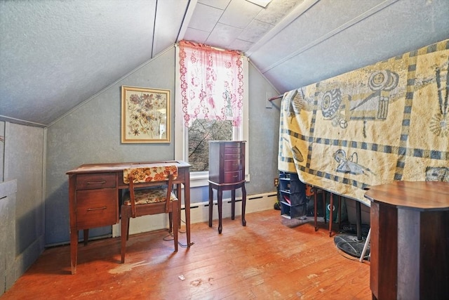 office area featuring lofted ceiling and wood-type flooring