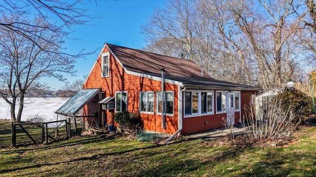 view of property exterior featuring a yard