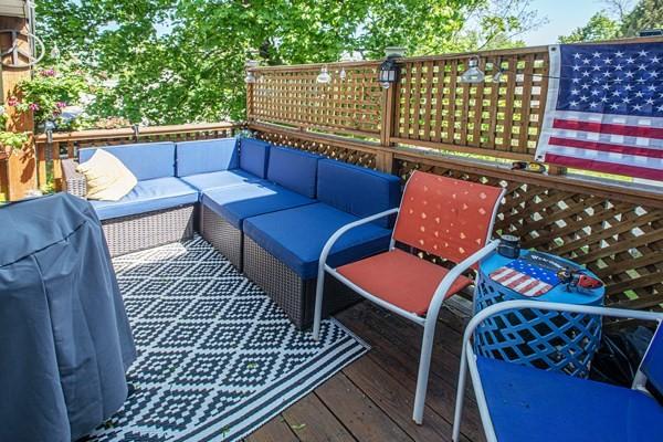 wooden deck with outdoor lounge area