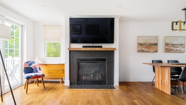 108 Central St, Ipswich, MA 01938 - living room with a tiled fireplace and wood finished floors