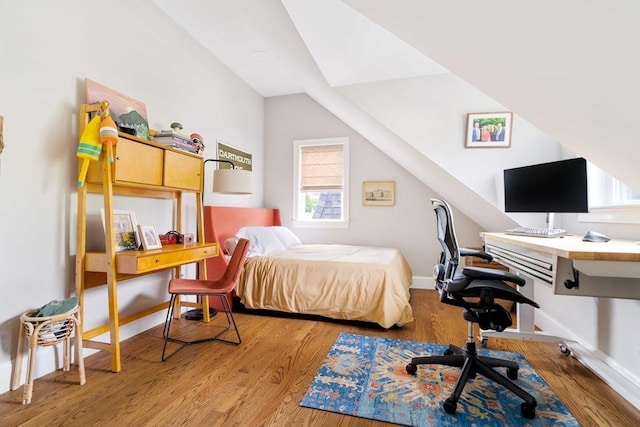 108 Central St, Ipswich, MA 01938 - bedroom featuring a desk, multiple windows, and light wood-type flooring