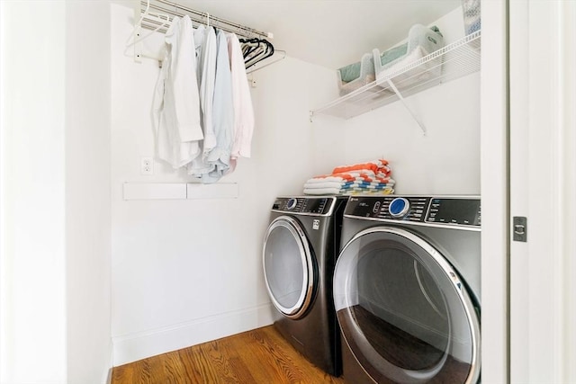 108 Central St, Ipswich, MA 01938 - laundry area featuring separate washer and dryer and wood finished floors