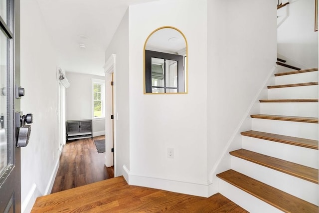108 Central St, Ipswich, MA 01938 - stairs featuring wood finished floors and baseboards