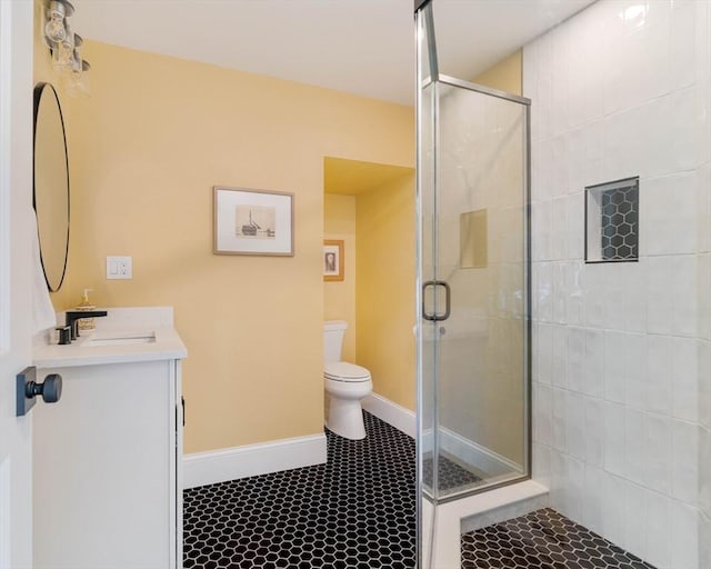 108 Central St, Ipswich, MA 01938 - full bathroom featuring vanity, a shower stall, and tile patterned flooring