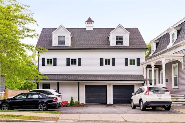 108 Central St, Ipswich, MA 01938 - view of front of home with an attached garage, driveway, and a shingled roof