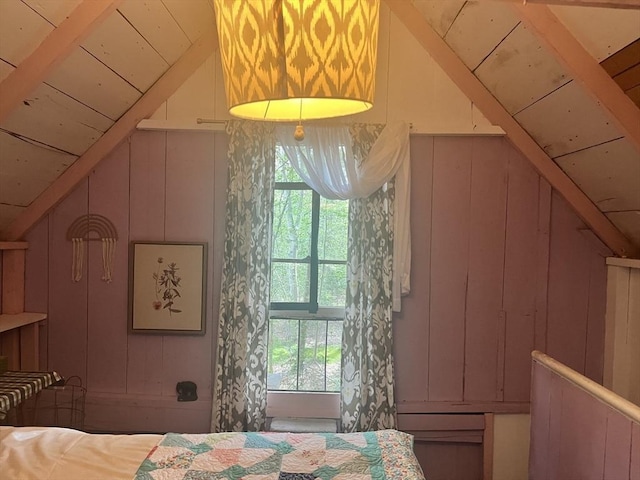 bedroom featuring lofted ceiling and wood ceiling