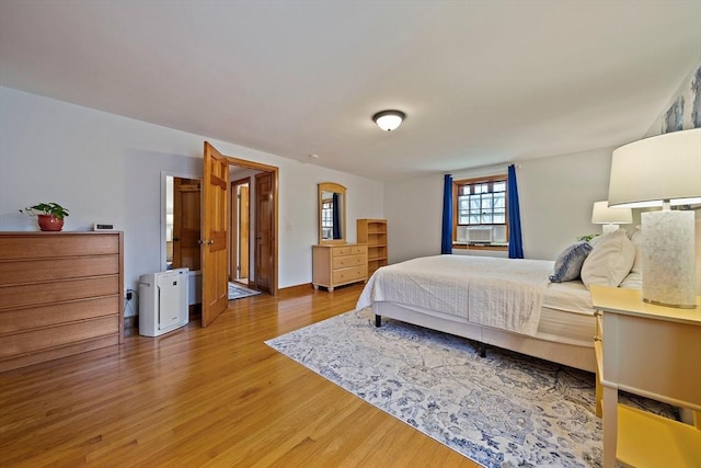bedroom with wood finished floors