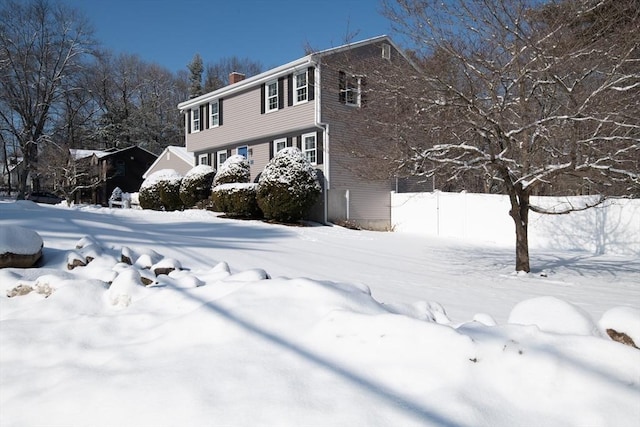 view of snow covered property