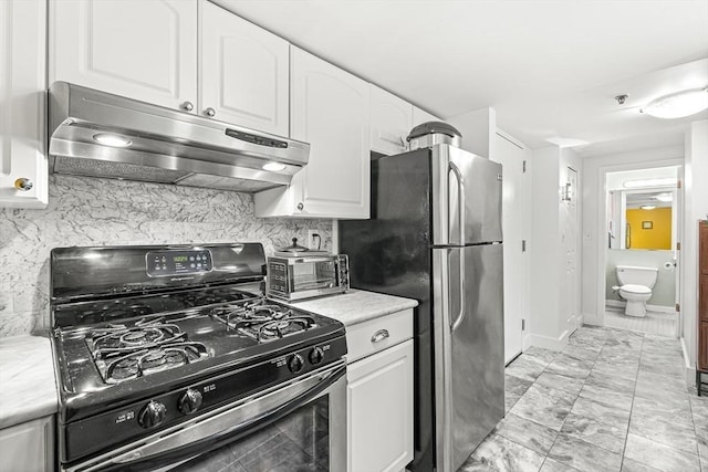 15 N Beacon Unit Ul01, Boston, MA 02134 - kitchen with gas range oven, under cabinet range hood, white cabinets, light countertops, and tasteful backsplash