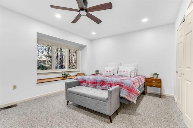 bedroom with carpet floors, a closet, and ceiling fan