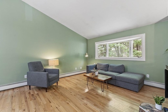 525 Flat Hill Rd, Lunenburg, MA 01462 - living room with baseboard heating, lofted ceiling, wood finished floors, and baseboards