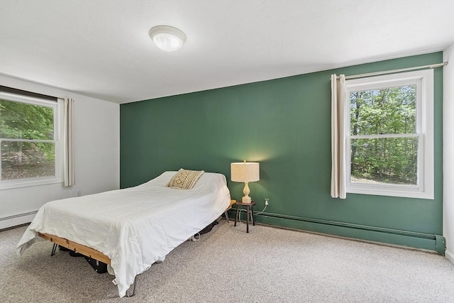 525 Flat Hill Rd, Lunenburg, MA 01462 - carpeted bedroom featuring a baseboard heating unit and baseboards