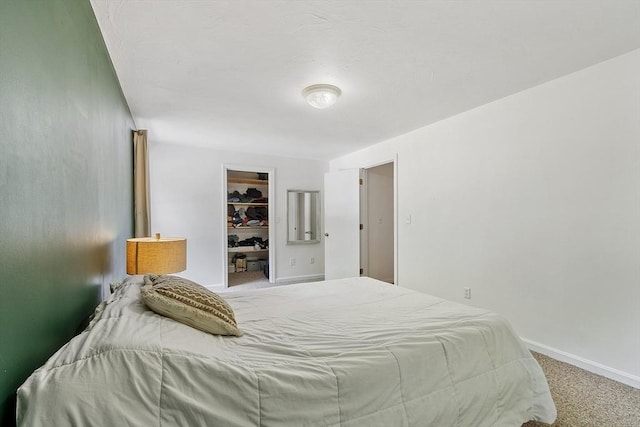 525 Flat Hill Rd, Lunenburg, MA 01462 - carpeted bedroom featuring baseboards and a walk in closet