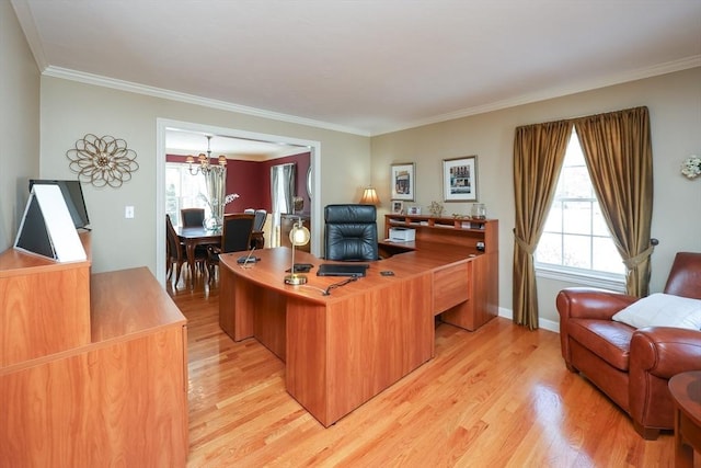 office with a notable chandelier, crown molding, and light wood-type flooring