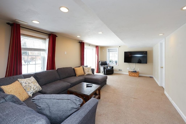 living room featuring light colored carpet