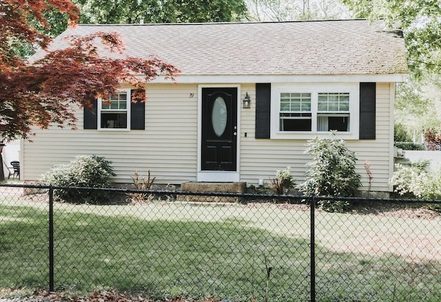 view of front of house featuring roof with shingles