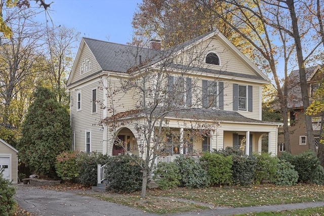 view of front of home featuring a garage and covered porch