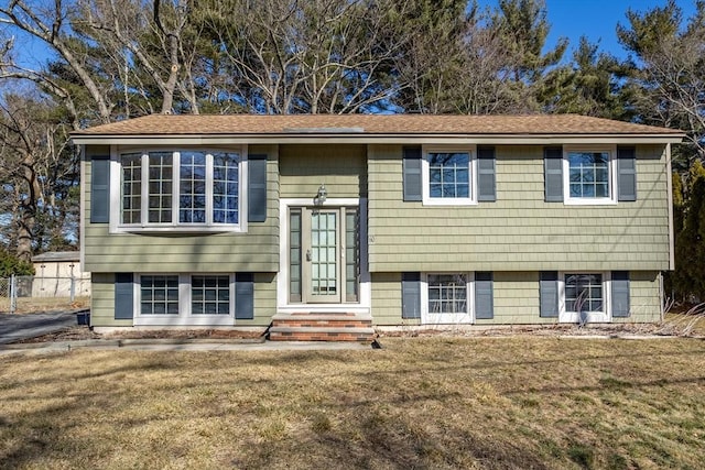 bi-level home with a front yard