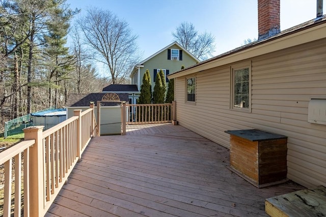 deck with an outbuilding