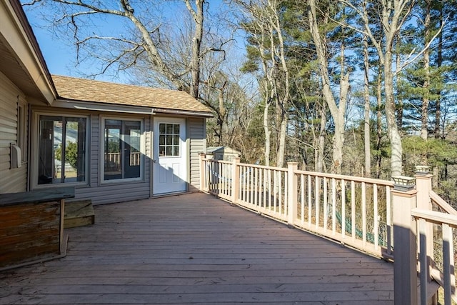 deck featuring an outbuilding