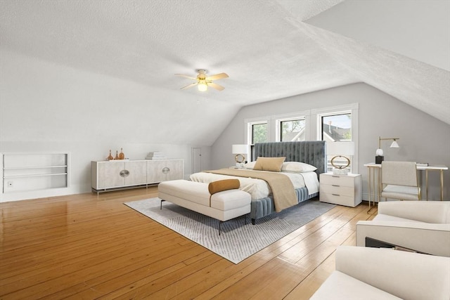27 Chilcott Pl Unit 2, Boston, MA 02130 - bedroom with a textured ceiling, lofted ceiling, hardwood / wood-style flooring, and a ceiling fan