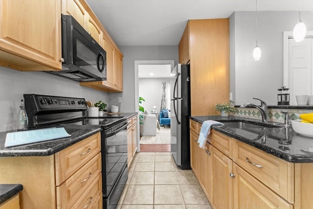 122 Baldwin Ave, Framingham, MA 01701 - kitchen featuring light brown cabinets, a sink, dark stone countertops, light tile patterned floors, and black appliances