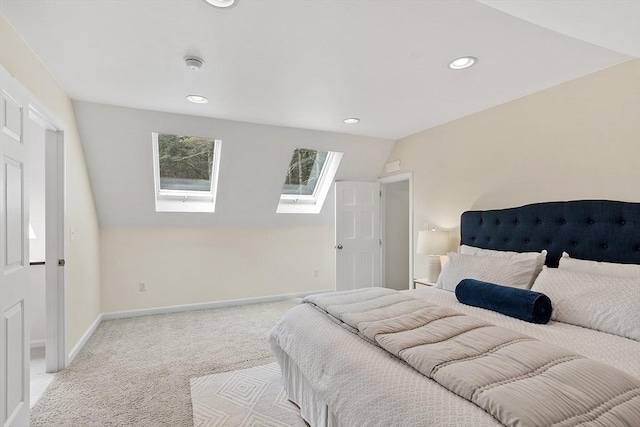 12 Green Needles Rd, Littleton, MA 01460 - carpeted bedroom featuring a skylight, vaulted ceiling, and recessed lighting