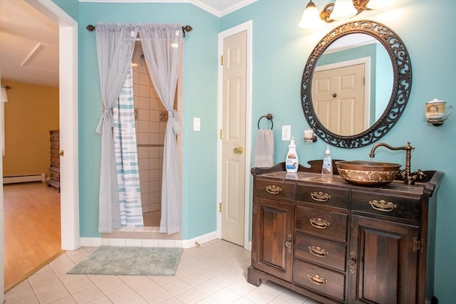 full bathroom featuring a baseboard radiator, a stall shower, tile patterned floors, vanity, and baseboards