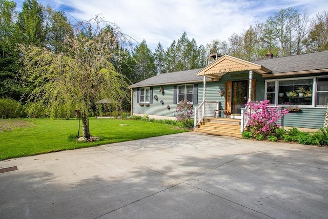 view of front of home with a front lawn