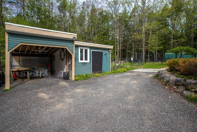garage featuring fence