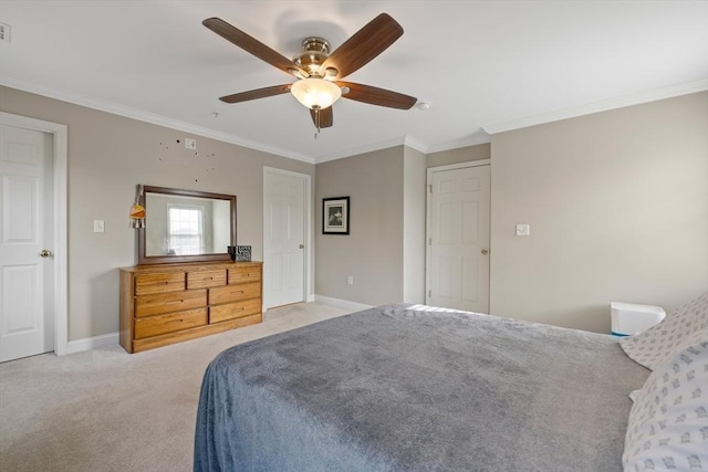 bedroom featuring a ceiling fan, visible vents, baseboards, ornamental molding, and light carpet