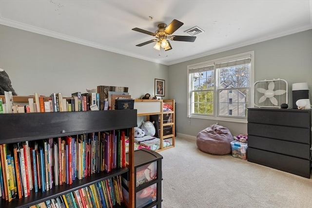bedroom with carpet floors, baseboards, visible vents, and crown molding