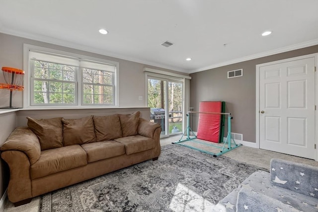 carpeted living room featuring visible vents, recessed lighting, and plenty of natural light
