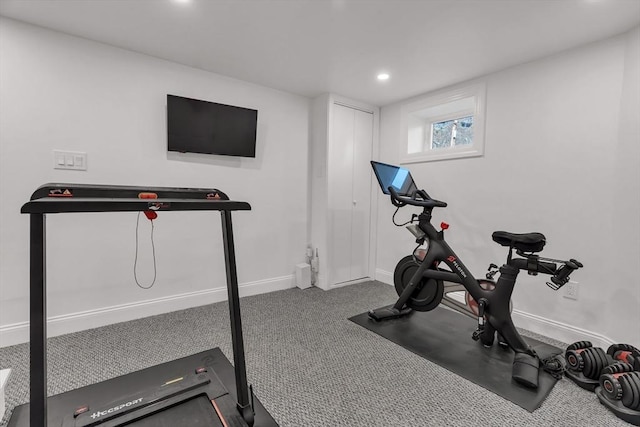 exercise room with baseboards, recessed lighting, and carpet flooring