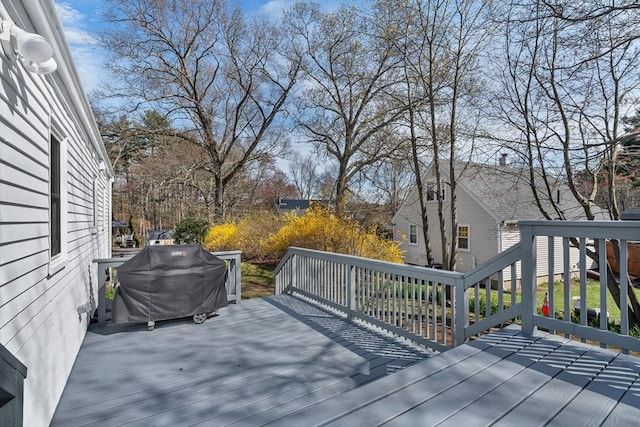 wooden deck with grilling area