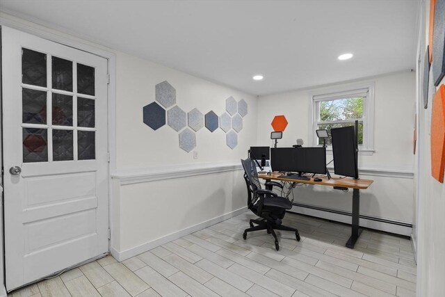 office area with recessed lighting, baseboards, a baseboard radiator, and light wood-type flooring