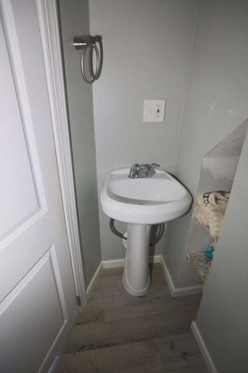 bathroom featuring hardwood / wood-style flooring