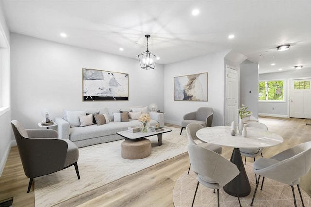 43 Pine St, Taunton, MA 02780 - living room featuring light wood finished floors, recessed lighting, baseboards, and a chandelier
